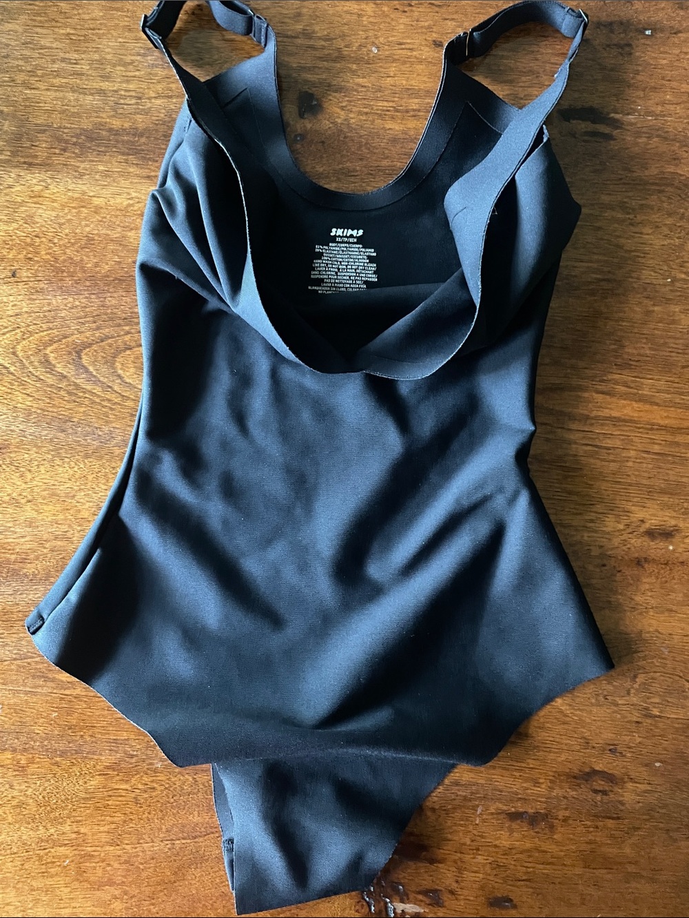 SKIMS  Black One-Piece Suit with Adjustable Straps